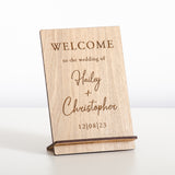 'Welcome to the wedding of' wooden sign