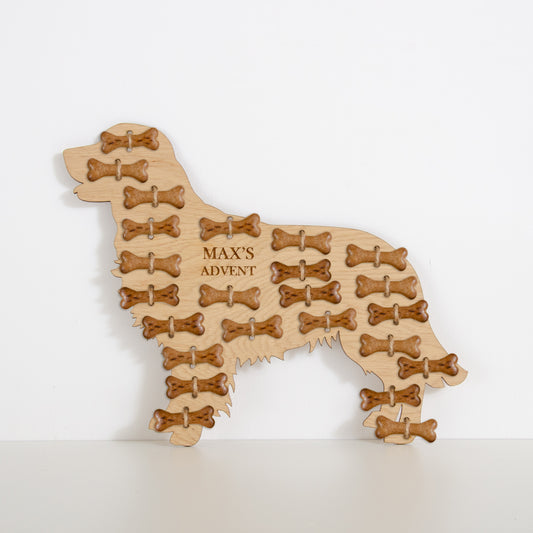 Golden retriever-shaped oak advent calendar engraved "Max's Advent" filled with bone treats
