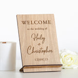 'Welcome to the wedding of' wooden sign