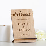 'Welcome to the wedding of' wooden sign