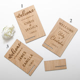 'Welcome to the wedding of' wooden sign