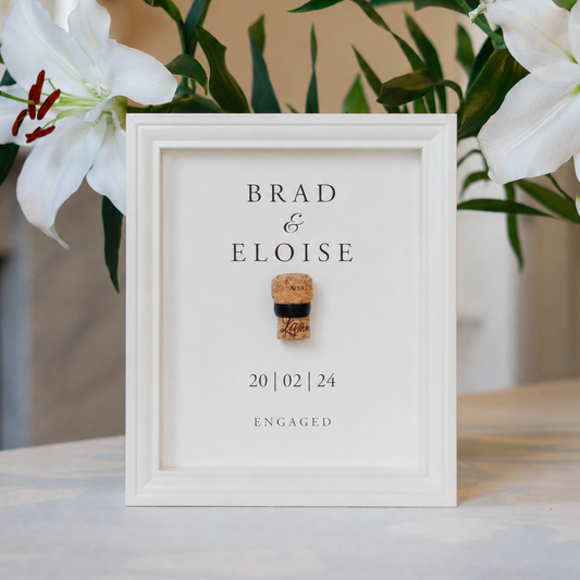 First toast engagement cork saver frame
