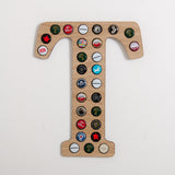 Initial beer cap wall hanging