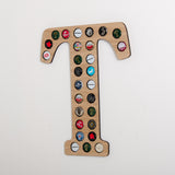 Initial beer cap wall hanging