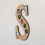 Initial beer cap wall hanging