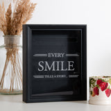 'Every smile tells a story' frame