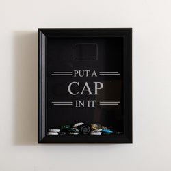 'Put a cap in it' frame