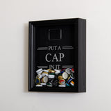 'Put a cap in it' frame