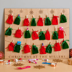 Oak Christmas advent calendar hanging board with velvet bags - Stag Design